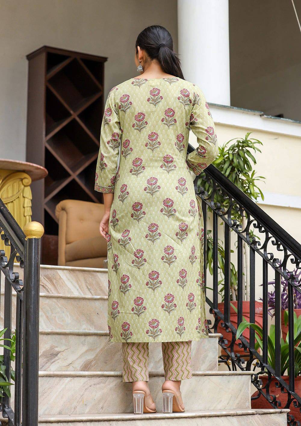 Soft cotton ethnic wear with sequined details for festive occasions.