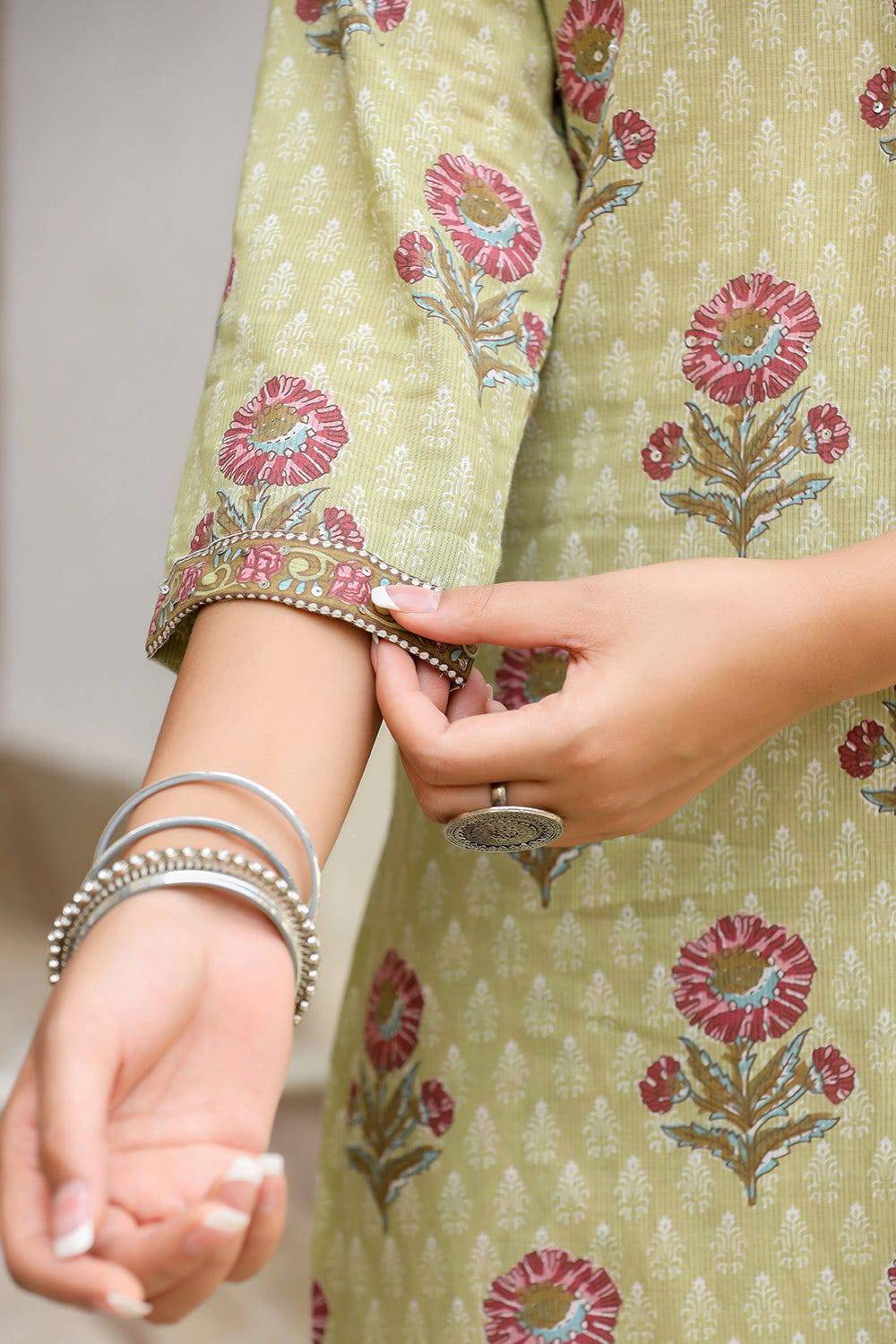 Beautiful sequin-embellished floral print kurta set for celebrations.