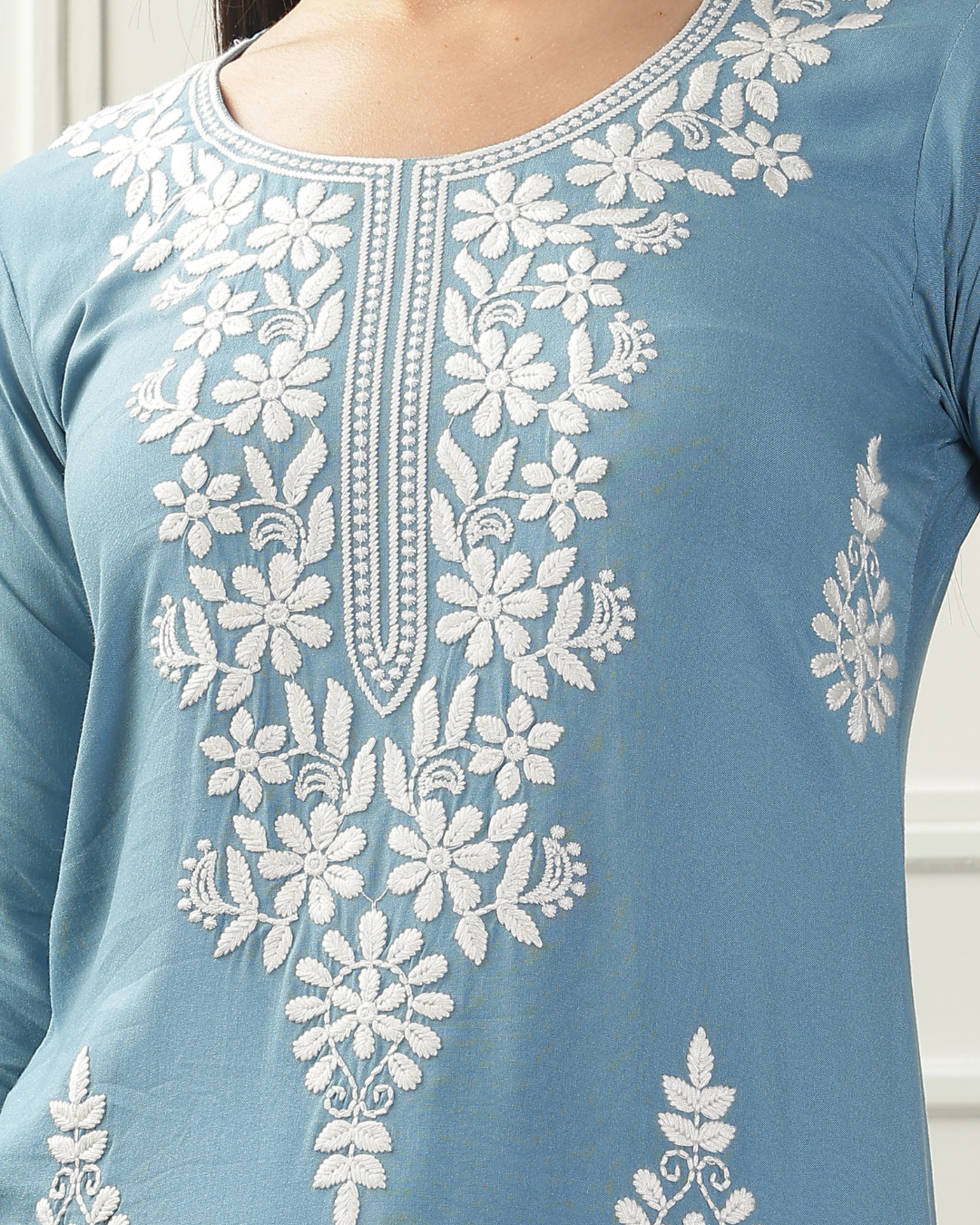 Elegant Chikankari embroidered kurti in breathable rayon fabric, perfect for festive and casual wear
