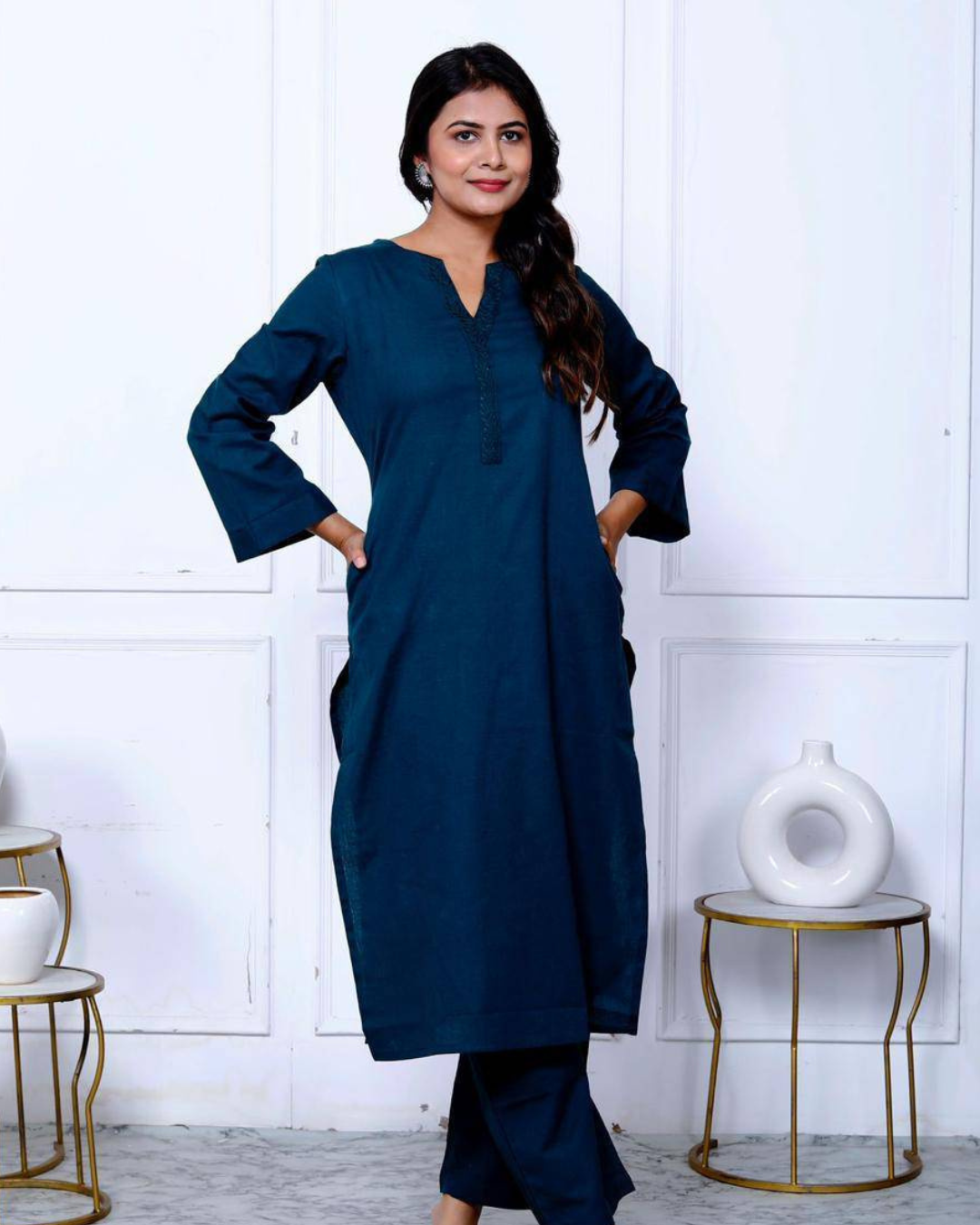 Functional and stylish navy blue kurta set with intricate embroidery and breathable fabric.