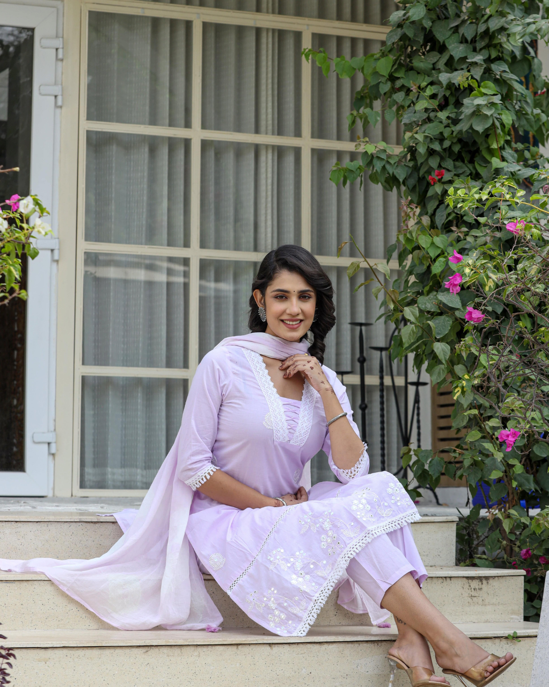 Traditional yet modern lavender kurta set, designed with floral prints and lace detailing