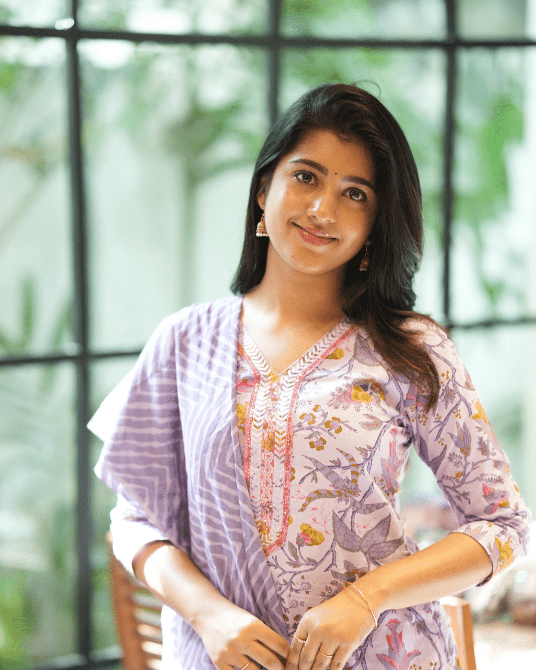Stylish three-piece cotton kurta set with intricate embroidery, perfect for traditional Indian occasions