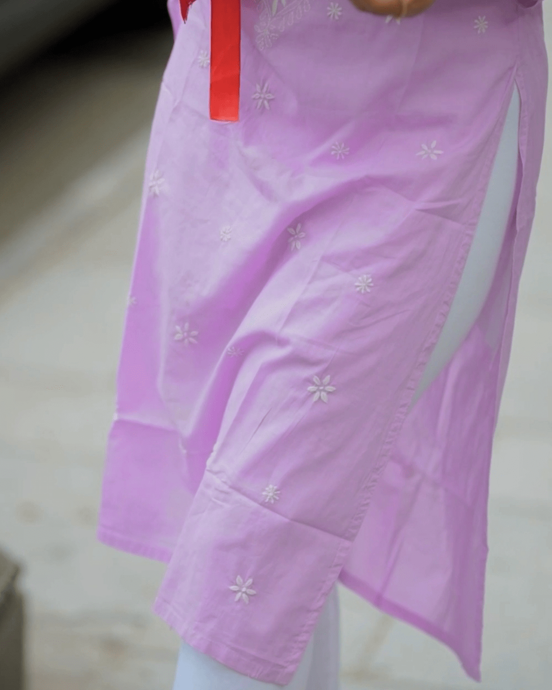 Chikankari floral motifs on lavender cotton kurta, designed by Layas Marts for elegance and comfort.