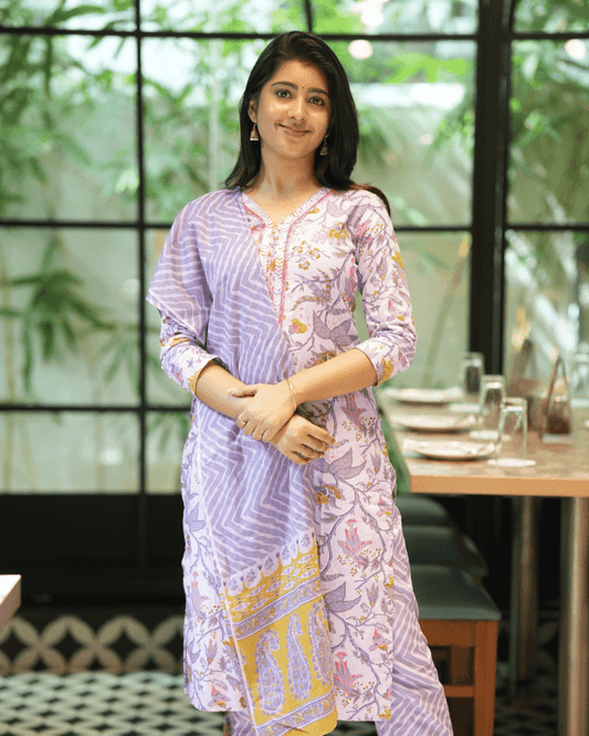 Lavender Floral Cotton Kurta Set for women, featuring a sequin-embroidered kurta, matching trousers, and a lightweight dupatta