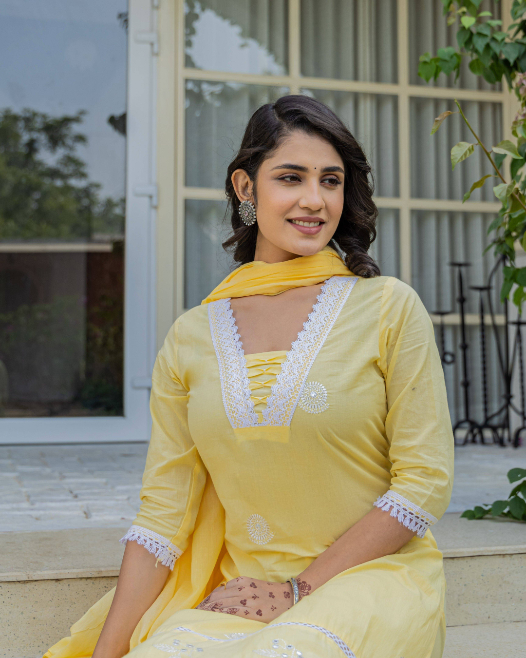 Elegant embroidered cotton kurta with matching trousers and a dupatta for ethnic styling.