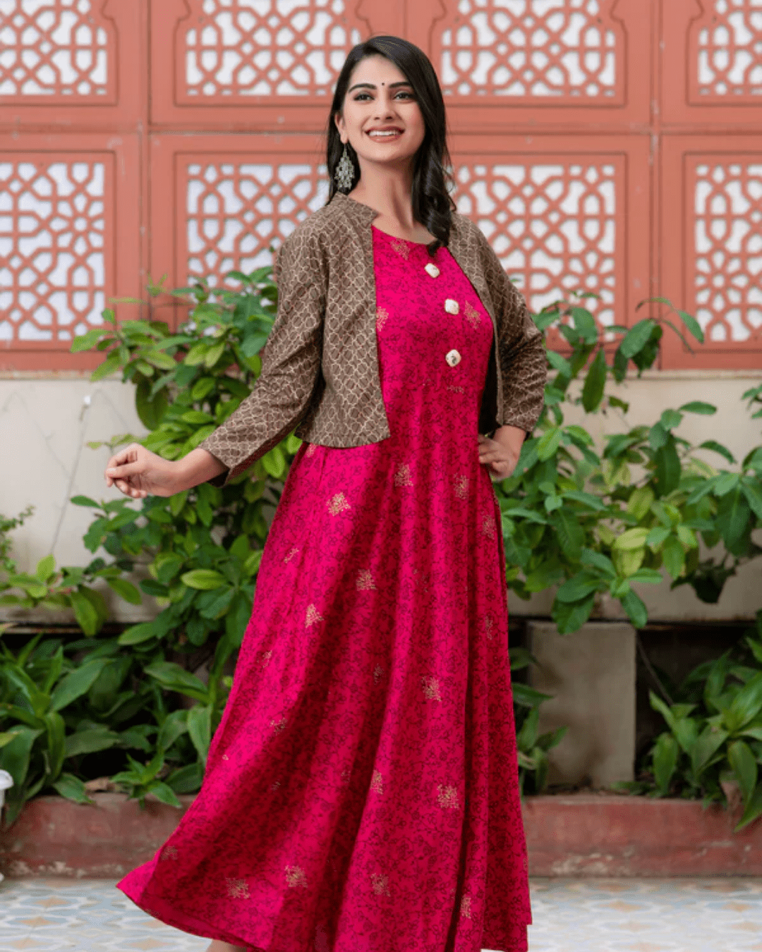 Partywear Anarkali kurta in pink, designed with gold print and a detachable jacket for an effortlessly elegant ensemble