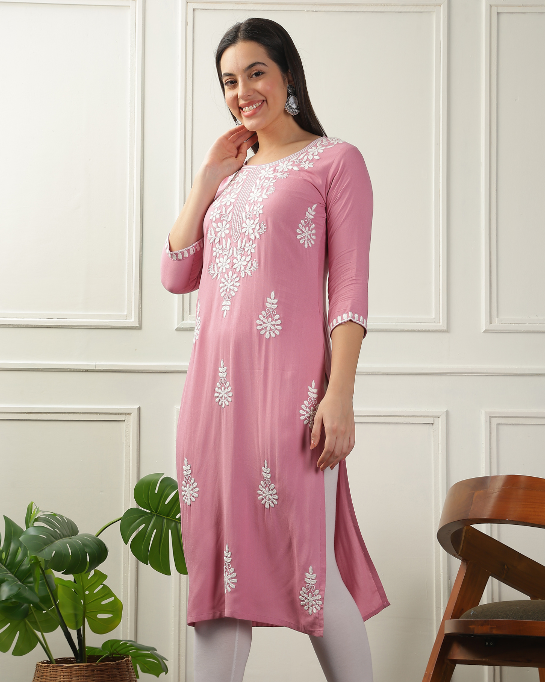 Long rayon chikankari kurti featuring intricate embroidery for a timeless ethnic look