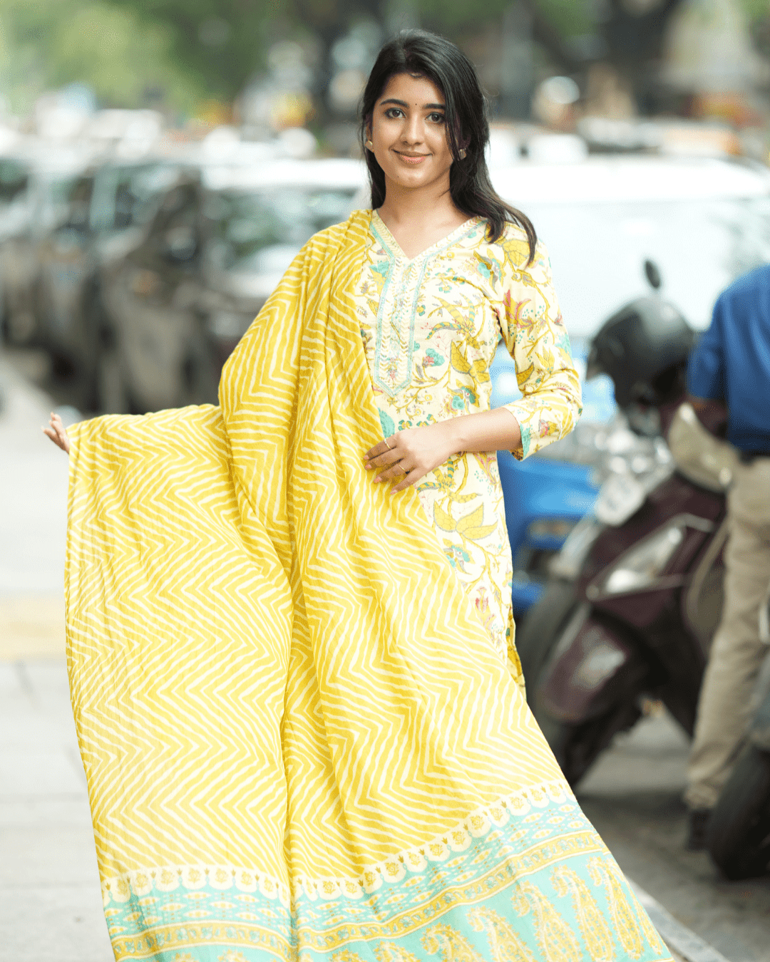 Yellow Floral Cotton Kurta Set styled with silver jhumkas and juttis for a chic ethnic look, available online at Layas Marts.