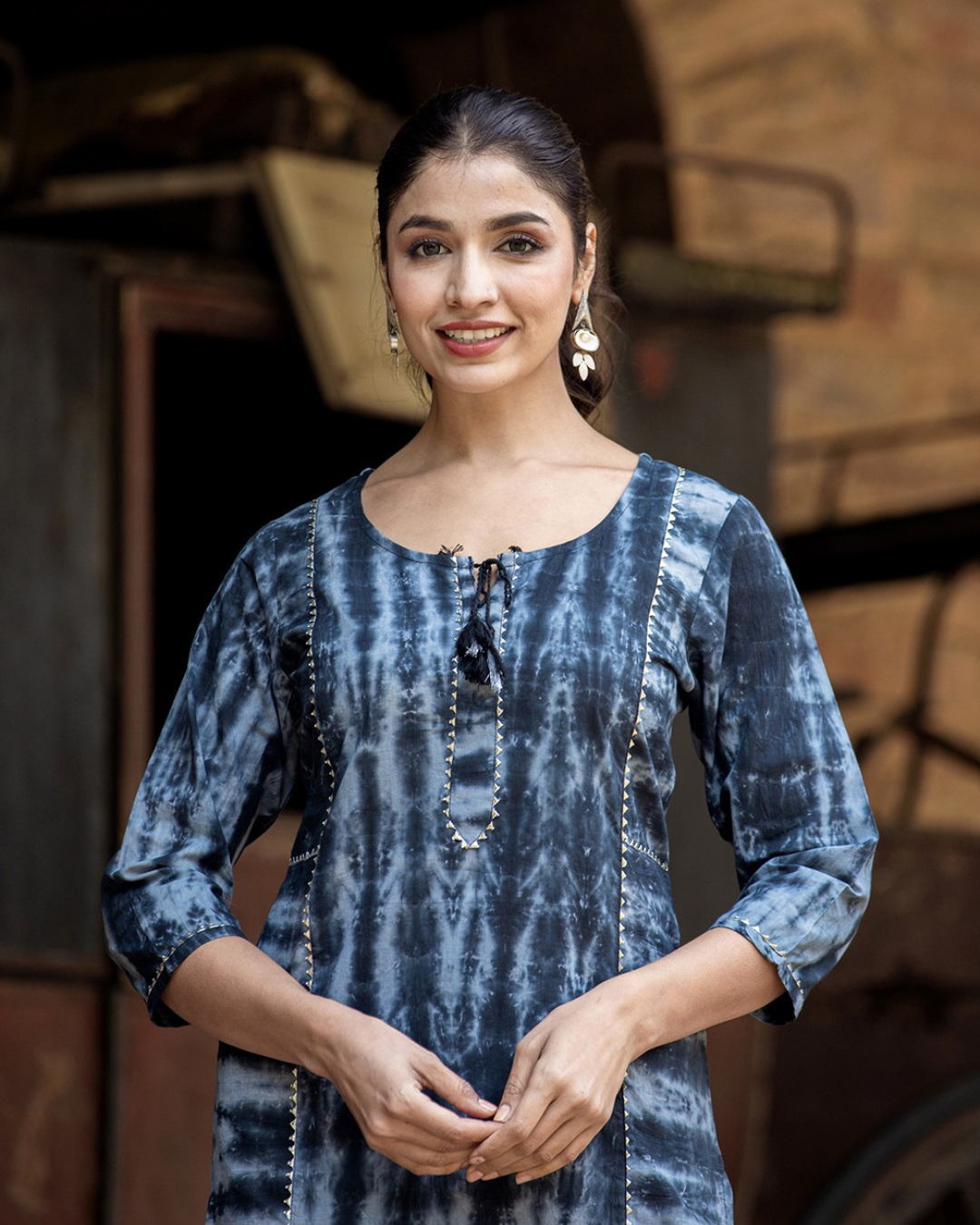 Bohemian-style tie-dye kurta from layas marts with front tassels, perfect for work or travel