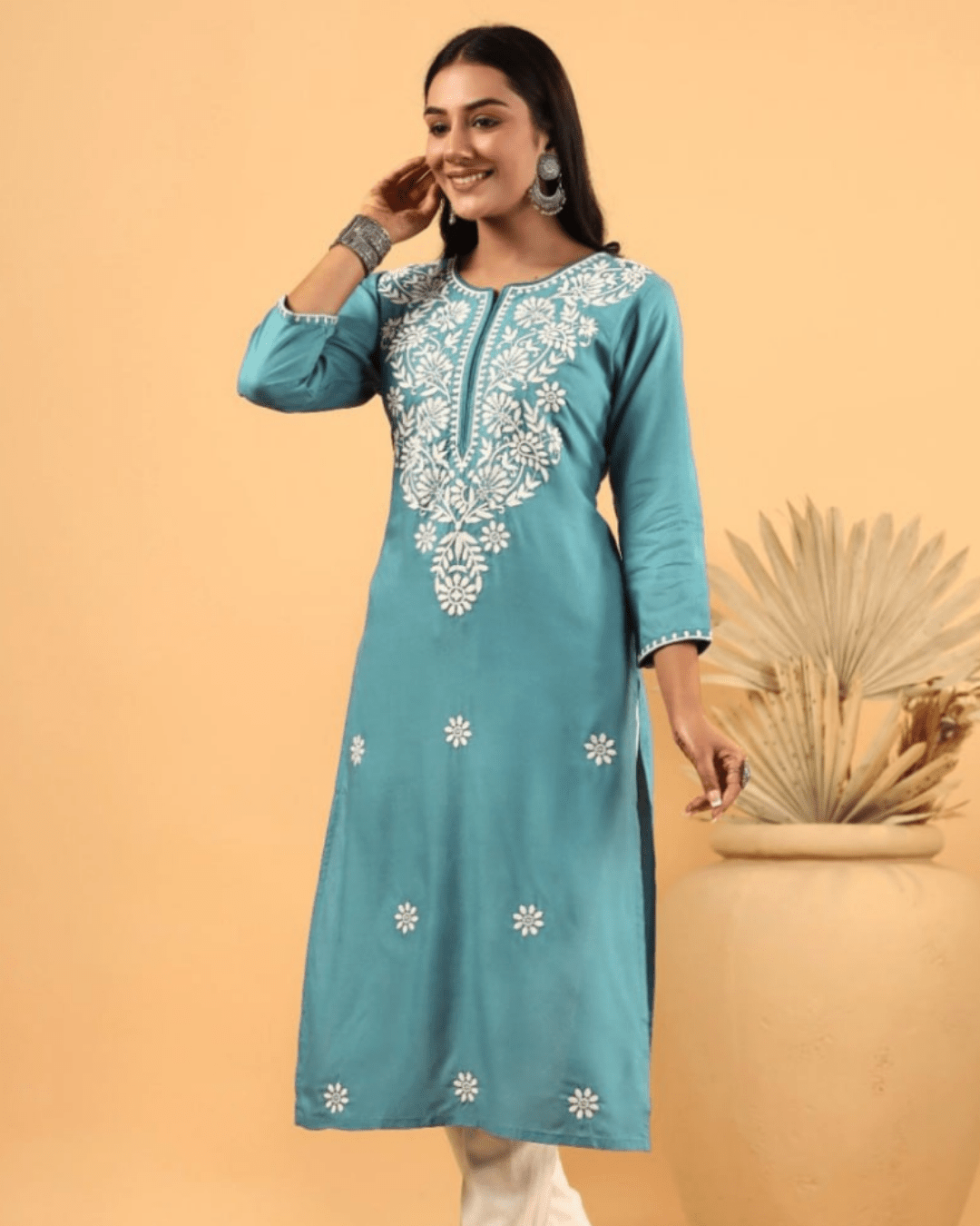 Soft rayon chikankari kurta with white embroidery, designed for effortless styling with palazzos and ethnic footwear