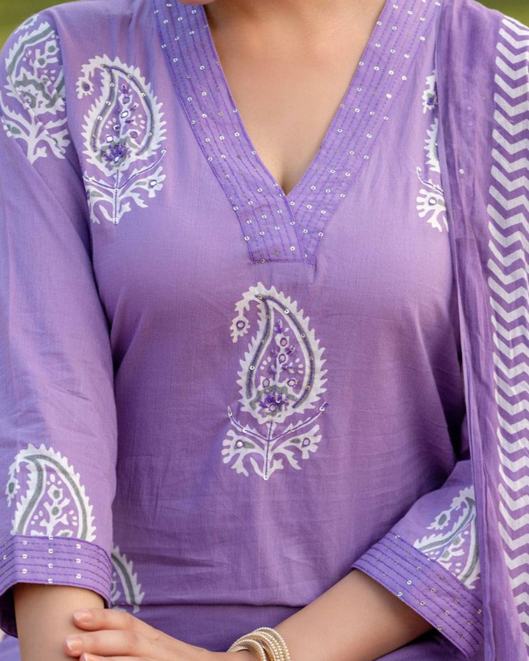 Handblock printed kurta set with breathable fabric, three-quarter sleeves, and a straight silhouette.
