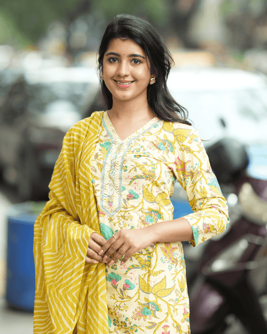 Yellow Floral Cotton Kurta Set with embroidered kurta, trousers, and dupatta, perfect for casual and festive occasions, from Layas Marts.