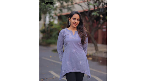 Woman wearing grey chikankari kurta styled with black trousers — Layas Marts
