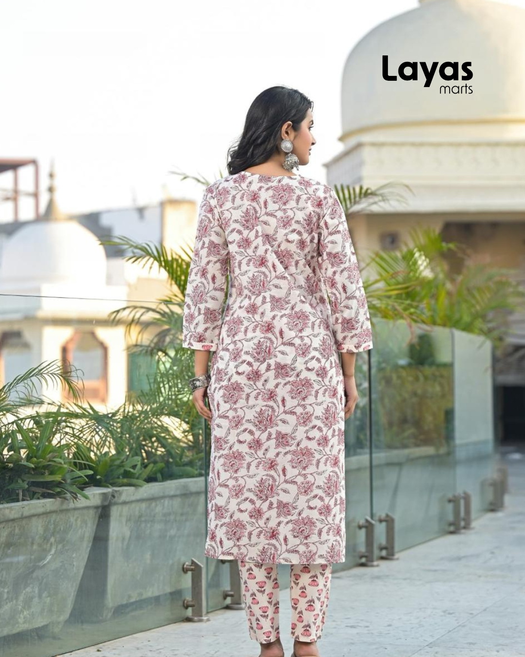 Rear view of floral printed cotton kurta set in pink