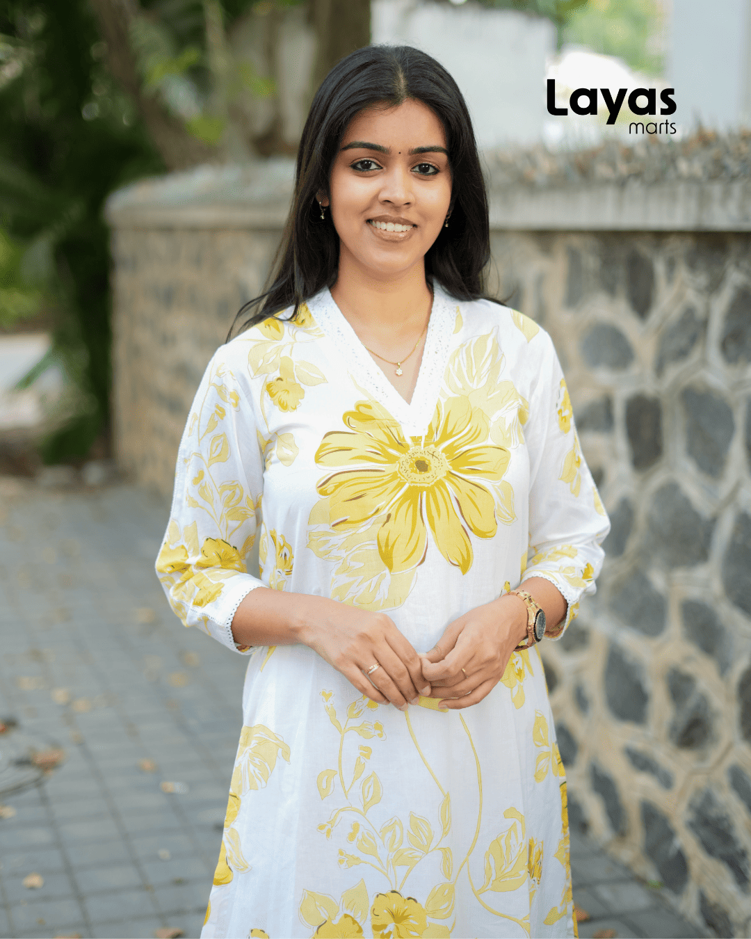 Lightweight summer outfit with floral prints and airy fabric.