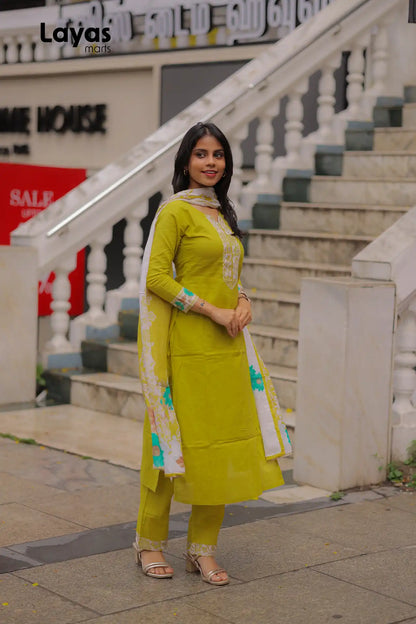 Side pose of olive yellow cotton kurta with mulmul dupatta -Layas Marts