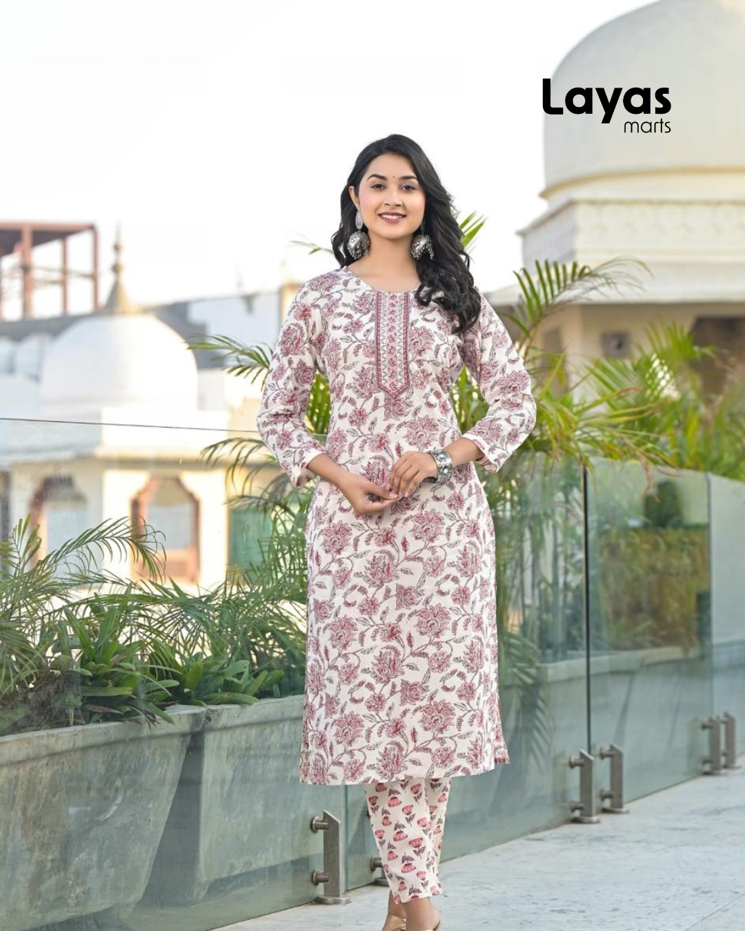 Close-up of neckline and embroidery on pink floral kurta