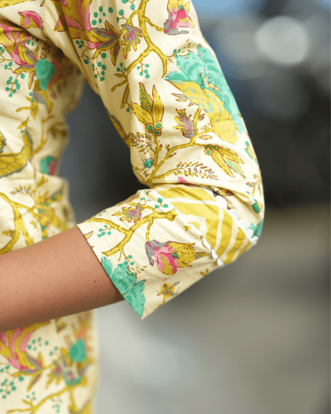 Detailed sequin embroidery on floral-printed cotton kurta with three-quarter sleeves, available at Layas Marts