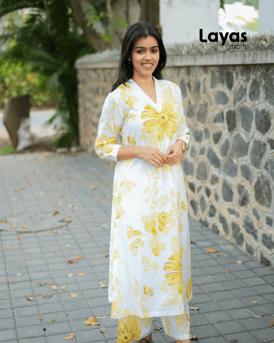 Elegant cotton co-ord set with yellow floral print and palazzo pants.