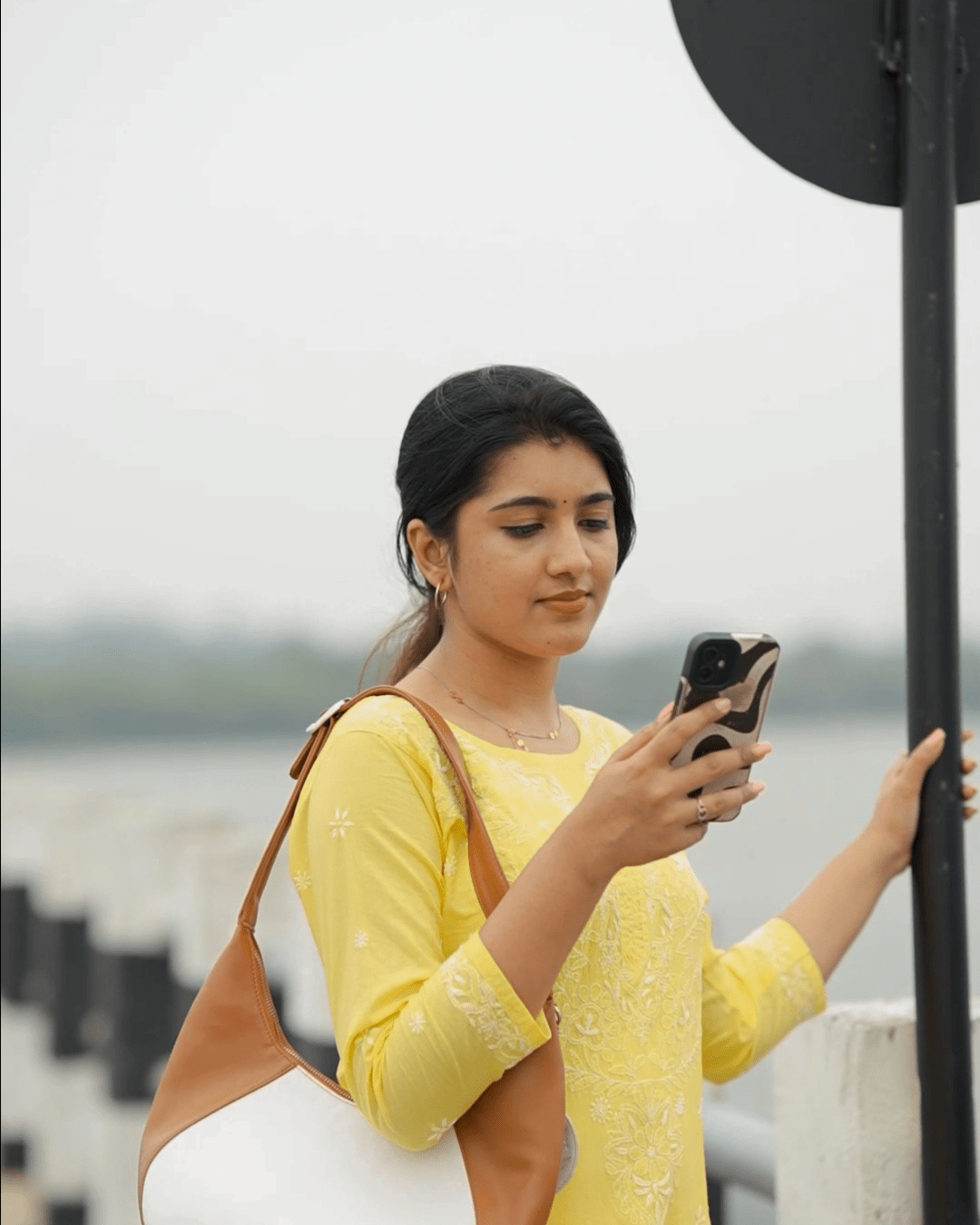 100% breathable cotton kurta in lemon yellow, featuring exquisite hand-stitched floral motifs.