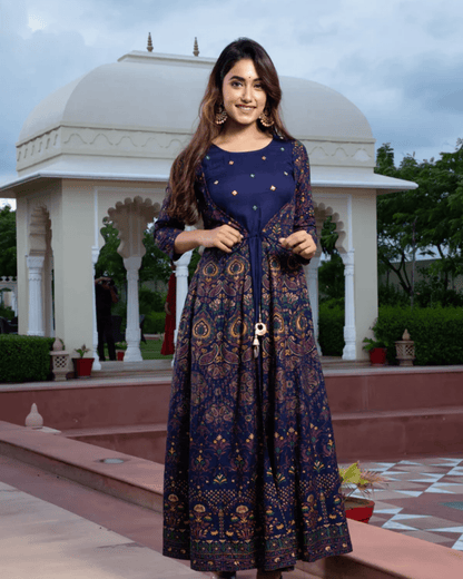 Flared rayon Anarkali kurta in dark blue and red, designed with an elegant jacket and breathable fabric for a stunning ethnic look.