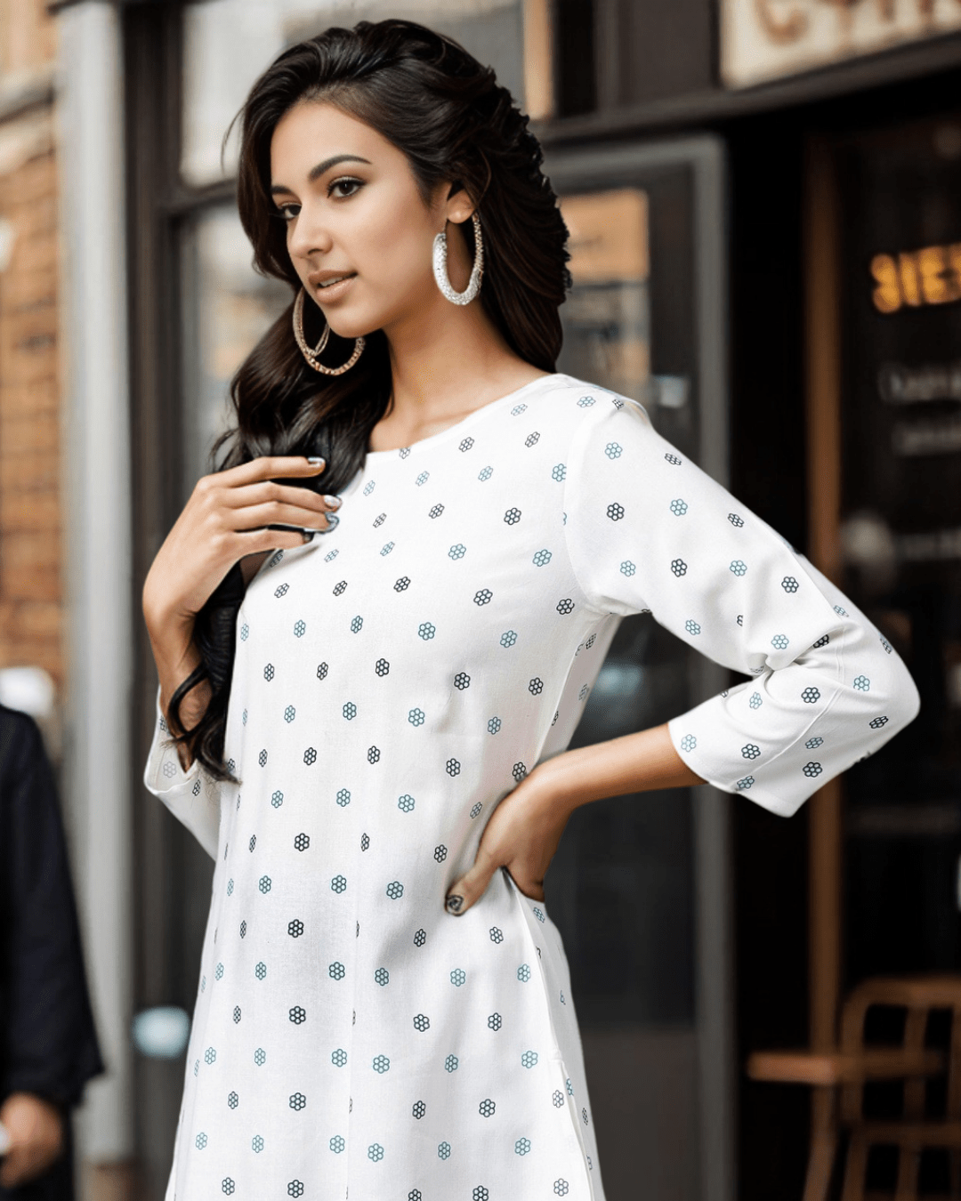 Casual and lightweight floral rayon kurta for Indian women, featuring an A-line fit and classic round neckline.