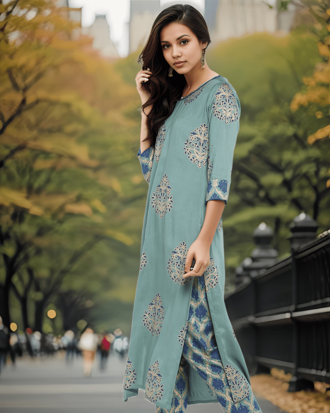 Elegant turquoise green kurta with foil print, round neckline, and three-quarter sleeves, perfect for everyday wear and festive occasions.