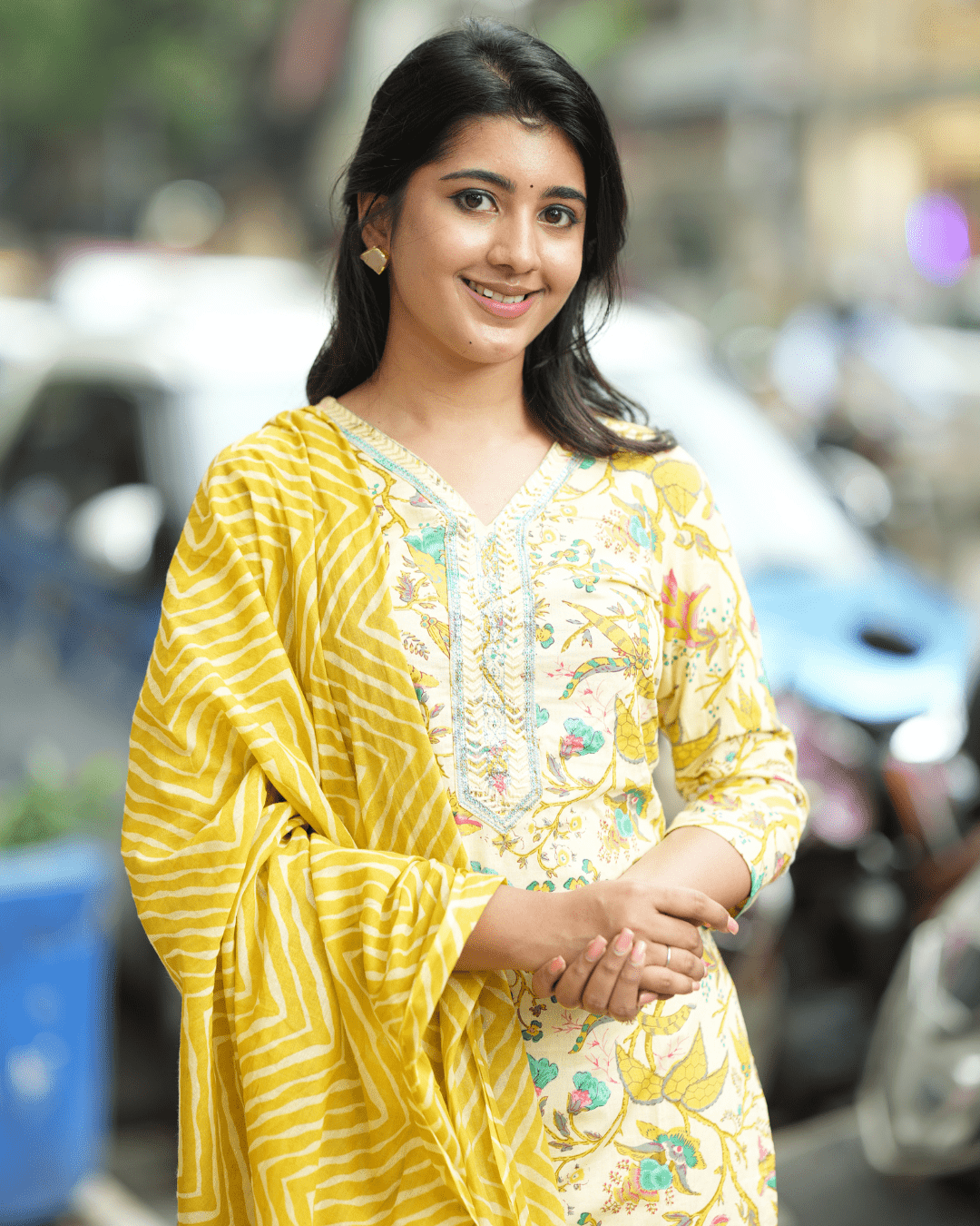 Detailed sequin embroidery on floral-printed cotton kurta with V-neck and three-quarter sleeves, available at Layas Marts