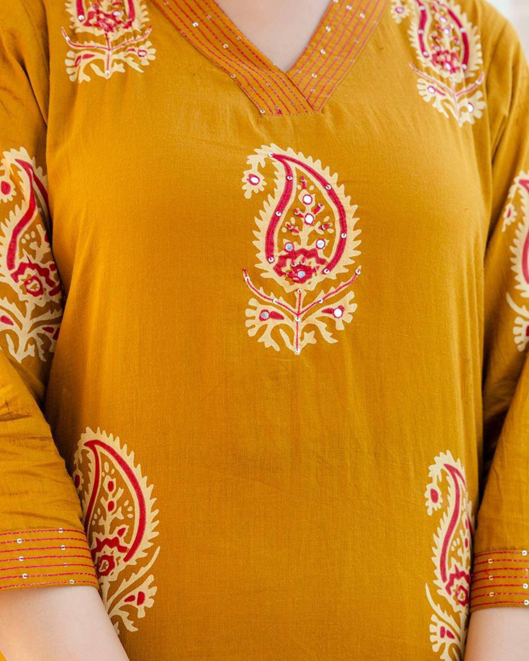 Handblock printed kurta set with breathable fabric, three-quarter sleeves, and a straight silhouette