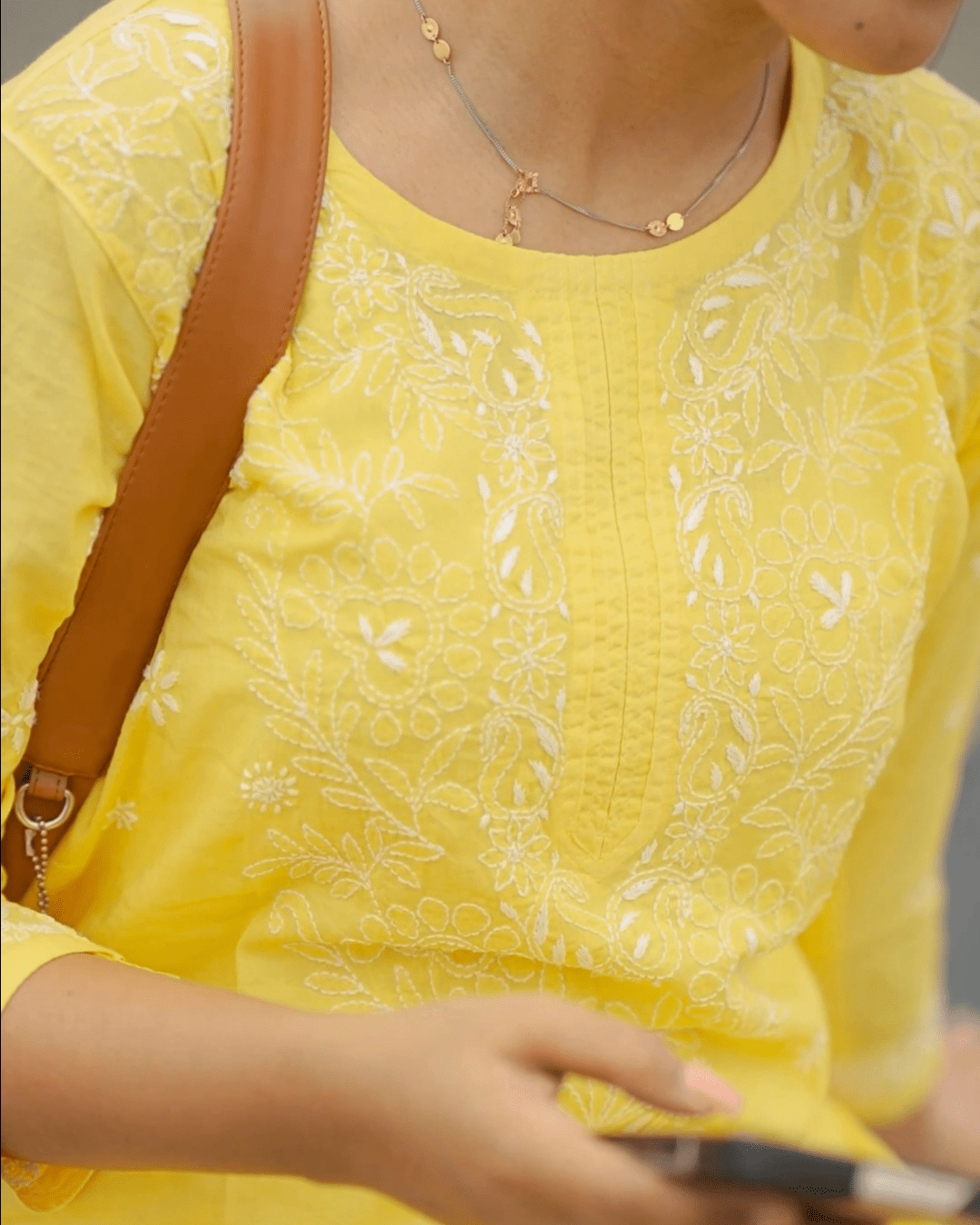 Handcrafted Lucknowi chikankari embroidery on a soft cotton fabric, perfect for casual and festive occasions.