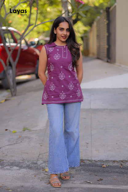 Jamun purple sleeveless cotton Chikankari short kurta styled with denims