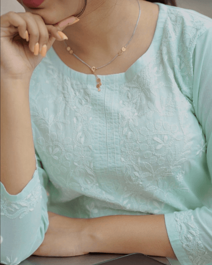 Lucknowi hand-embroidered cotton kurta with a straight-fit silhouette and quarter sleeves, ideal for casual and festive occasions.