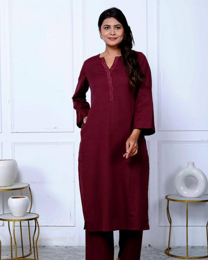 Maroon Cotton Embroidered Kurta Set with Double Pockets, featuring a relaxed fit.