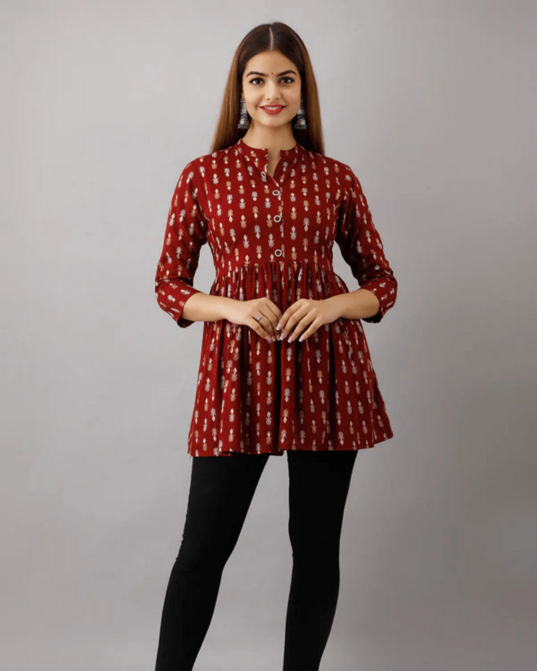 Breathable rayon tunic top with a stylish collar neck, ideal for pairing with jeans, palazzos, or leggings.