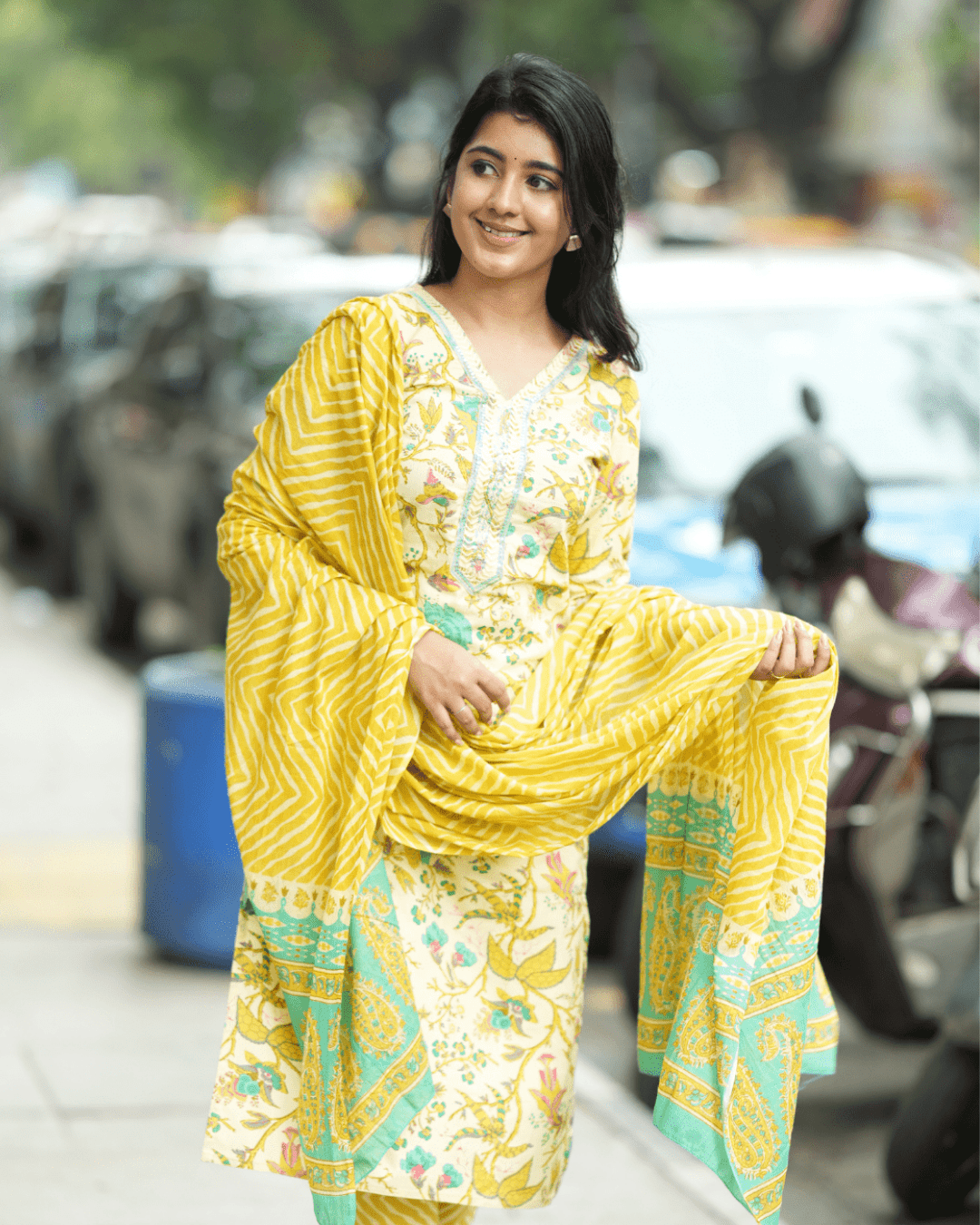 cotton trousers with elastic waistband and side pocket, part of the Yellow Floral Kurta Set by Layas Marts