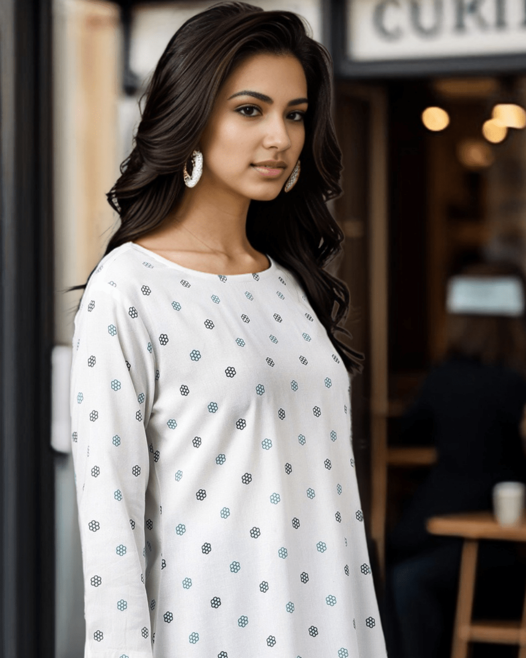 Round-neck floral printed rayon kurta designed for comfort and elegance, featuring a stylish A-line silhouette at Layas Marts.