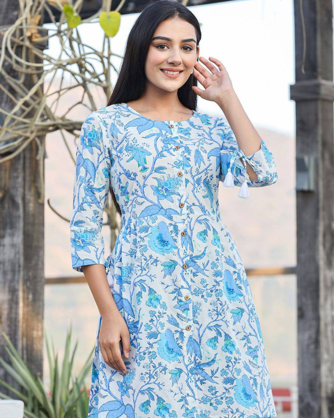 Sky Blue Floral Printed Cotton Top Online, featuring a soft and breathable fabric with a relaxed fit, available at Layas Marts.