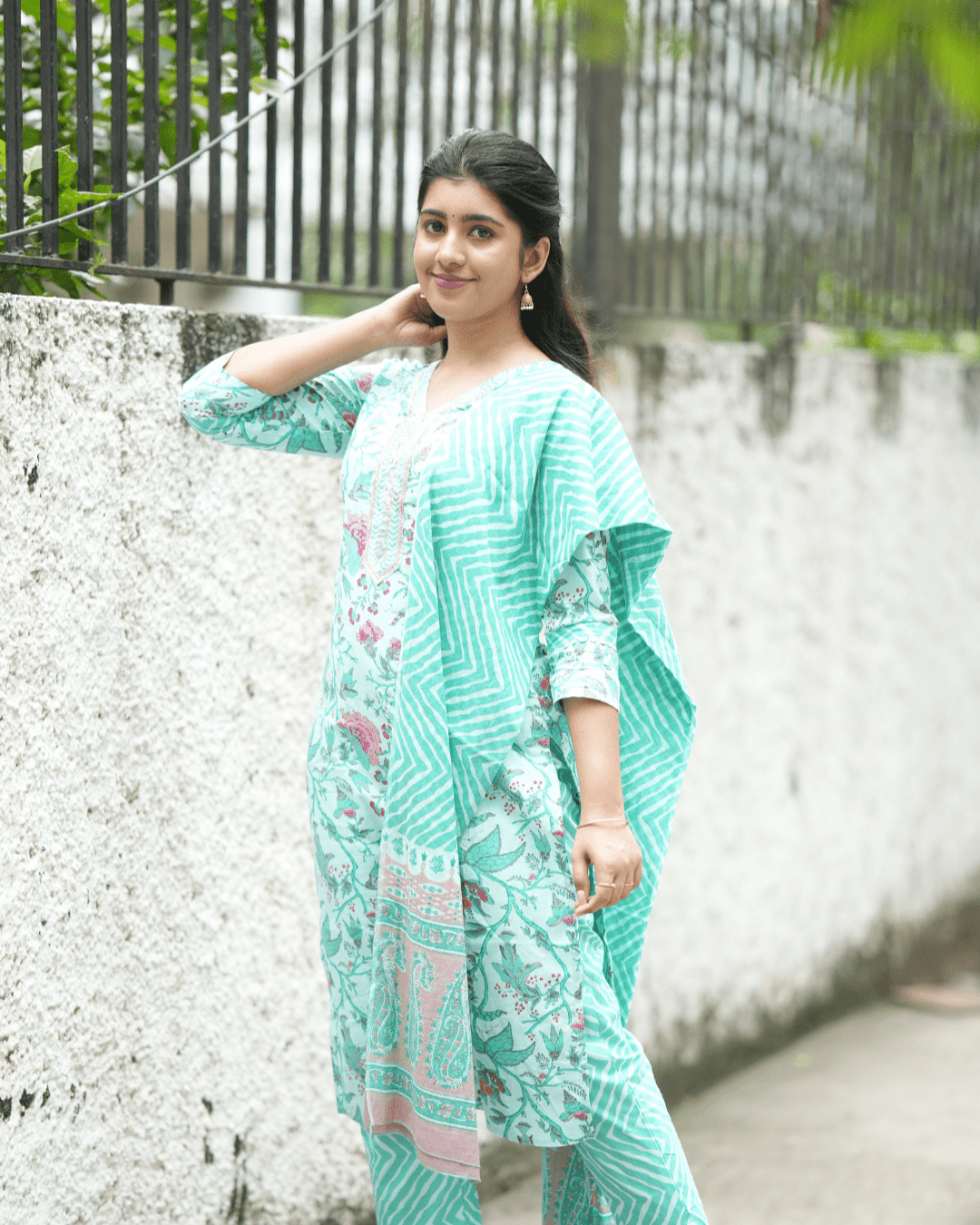 Modern yet traditional teal cotton kurta set with intricate embroidery, ideal for office wear, festive celebrations, and everyday elegance.