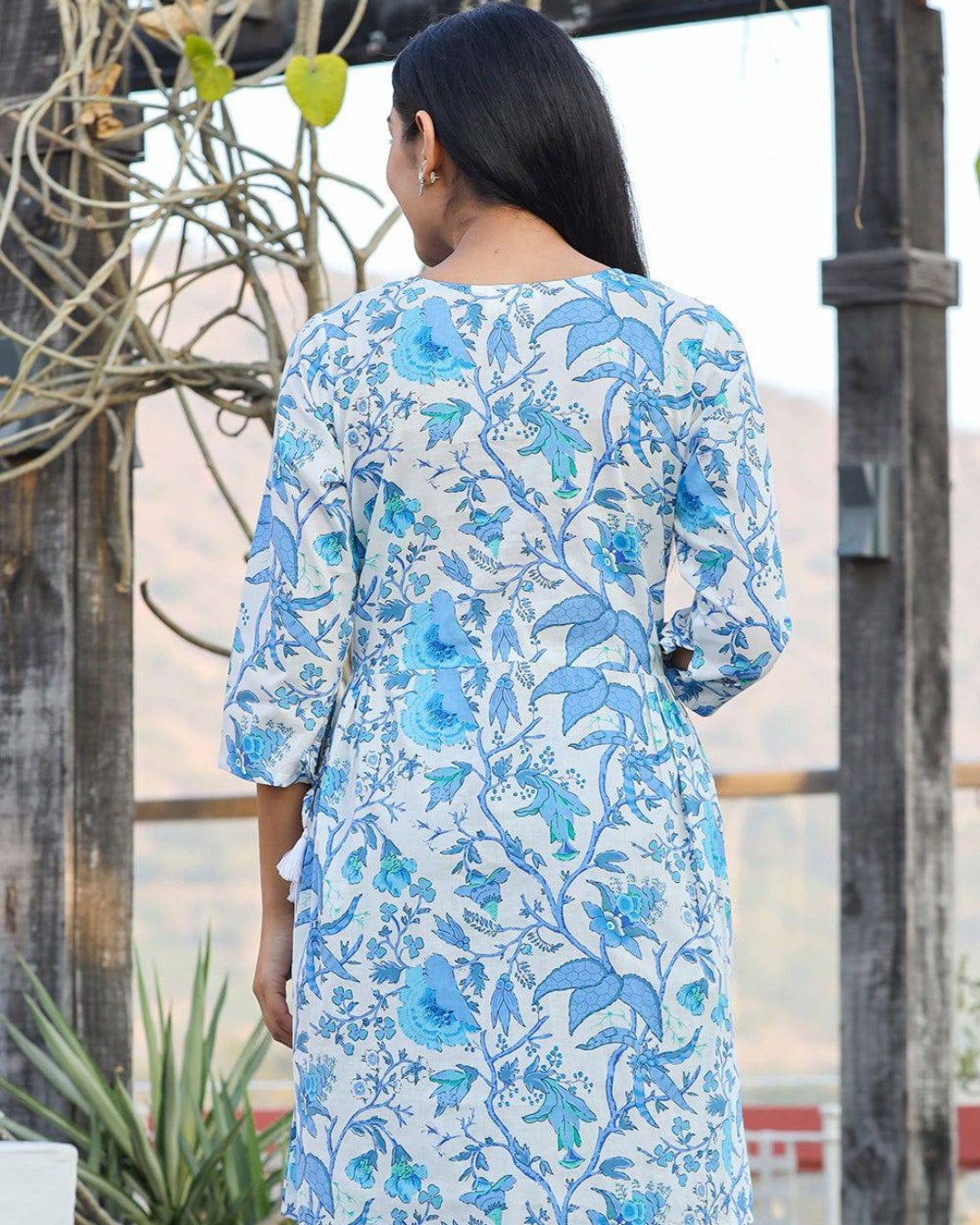 Breathable cotton floral top in sky blue, perfect for Indian summers and everyday wear.