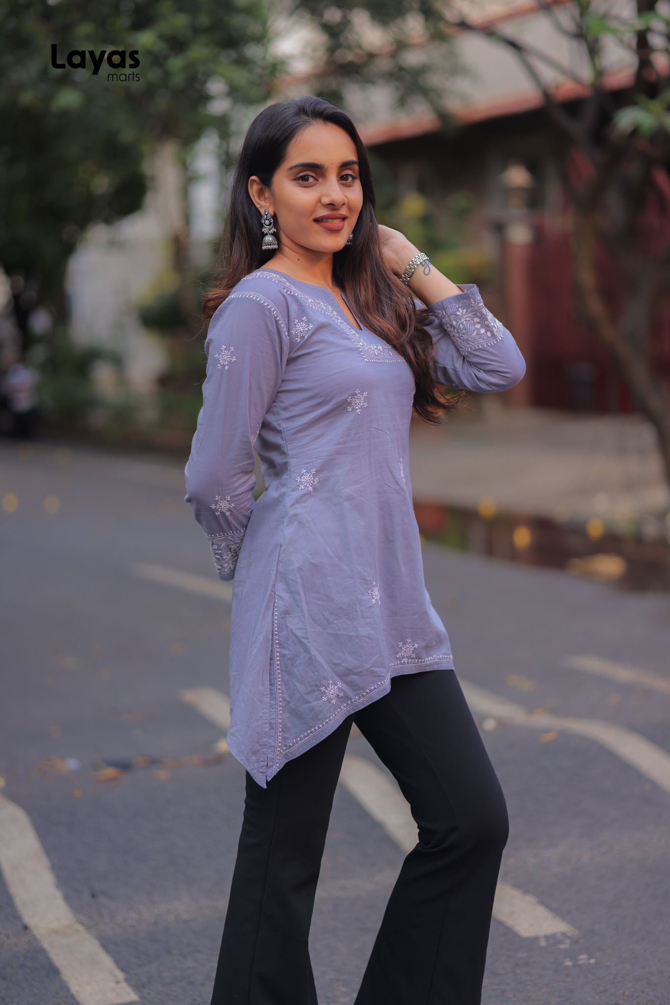 White Chikankari hand embroidery detail on grey cotton top from Layas Marts