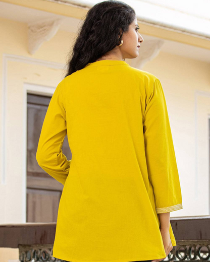 Yellow Chikankari Cotton Short Kurti  from Layas Marts, perfect for casual and festive occasions