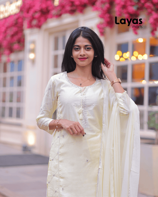 Front view of Zari Yellow Pure Silk Embroidered Kurta with trousers and dupatta by Layas Marts